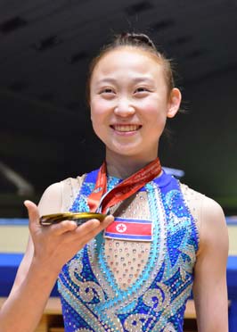 Players demonstrate development of acrobatic gymnastics of Juche Korea